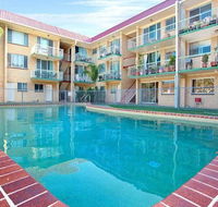 Bribie Beach King bed Unit overlooking pool - Kingaroy Accommodation